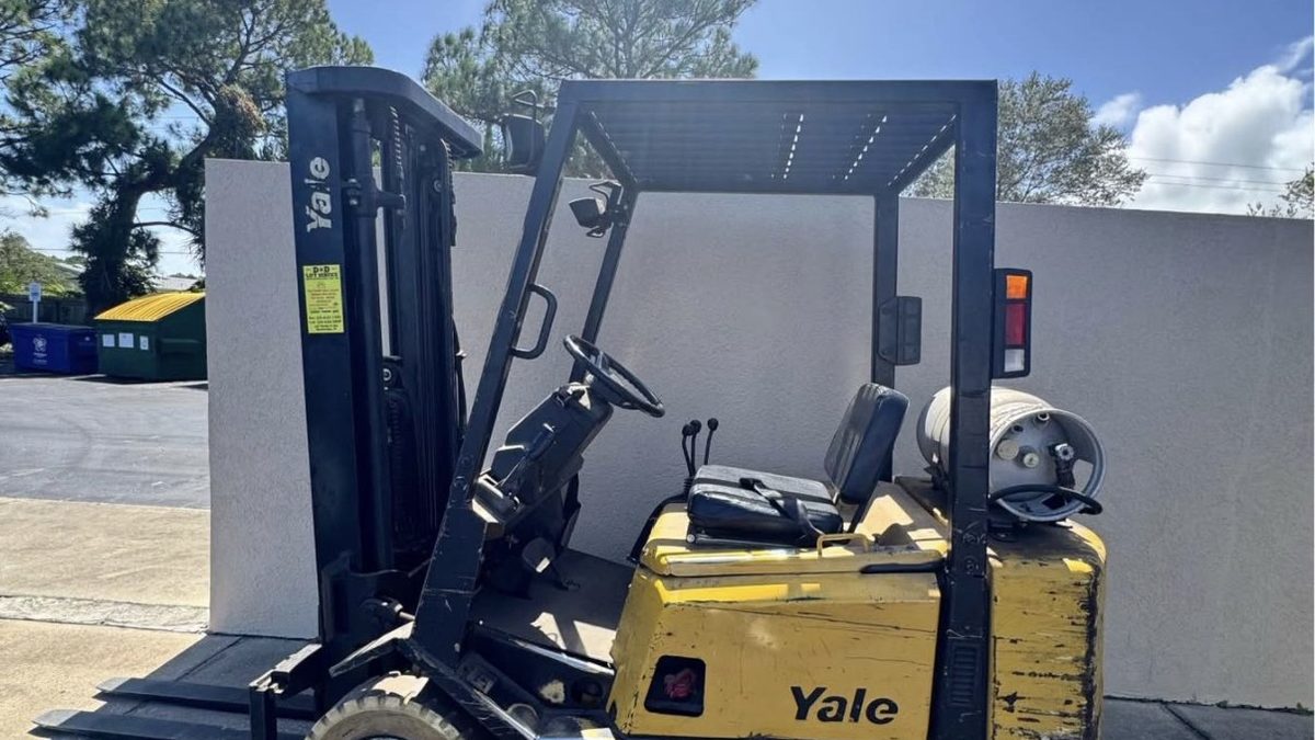Used Yale electric forklift with mast raised, an example of an older lift truck we still pay cash for